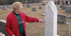 Mom at the grave of her grandmother.
